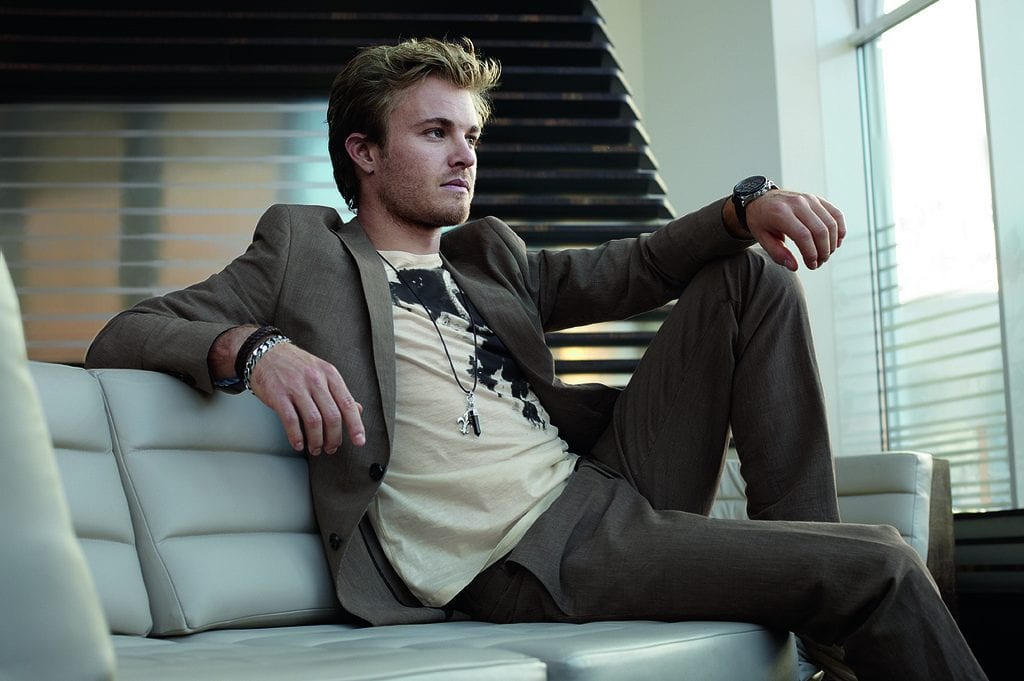 Nico Rosberg reclining on a sofa.