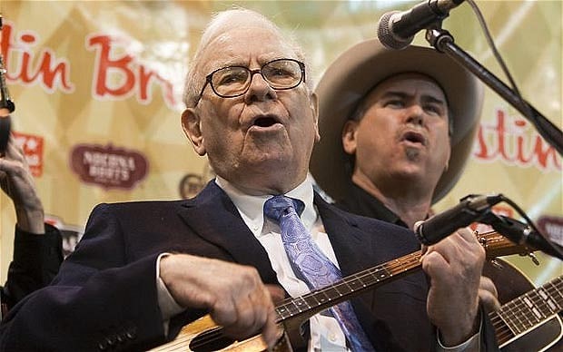 Warren Buffett playing a ukelele.