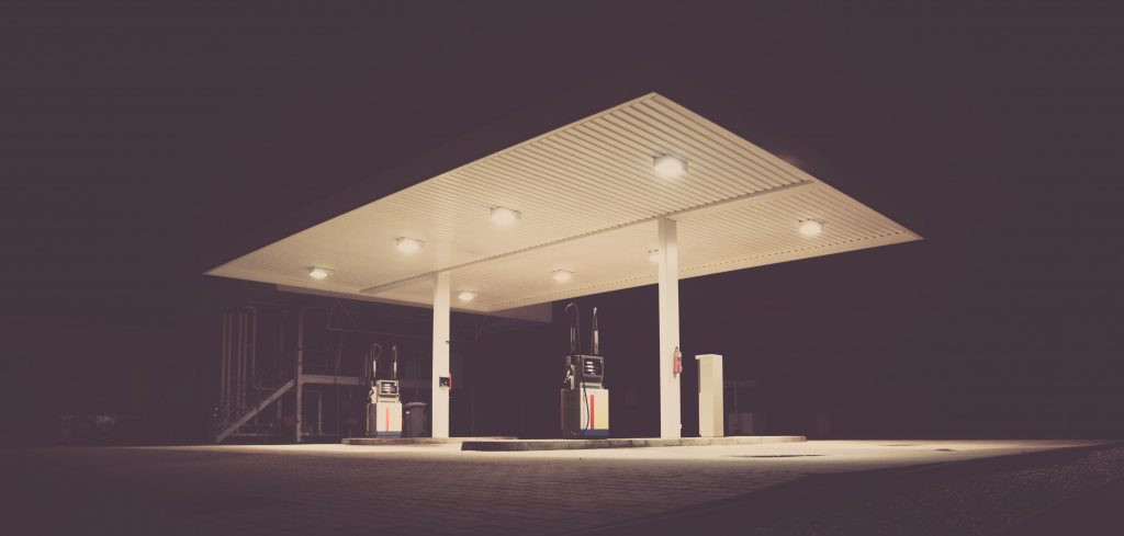 Empty petrol station at night.