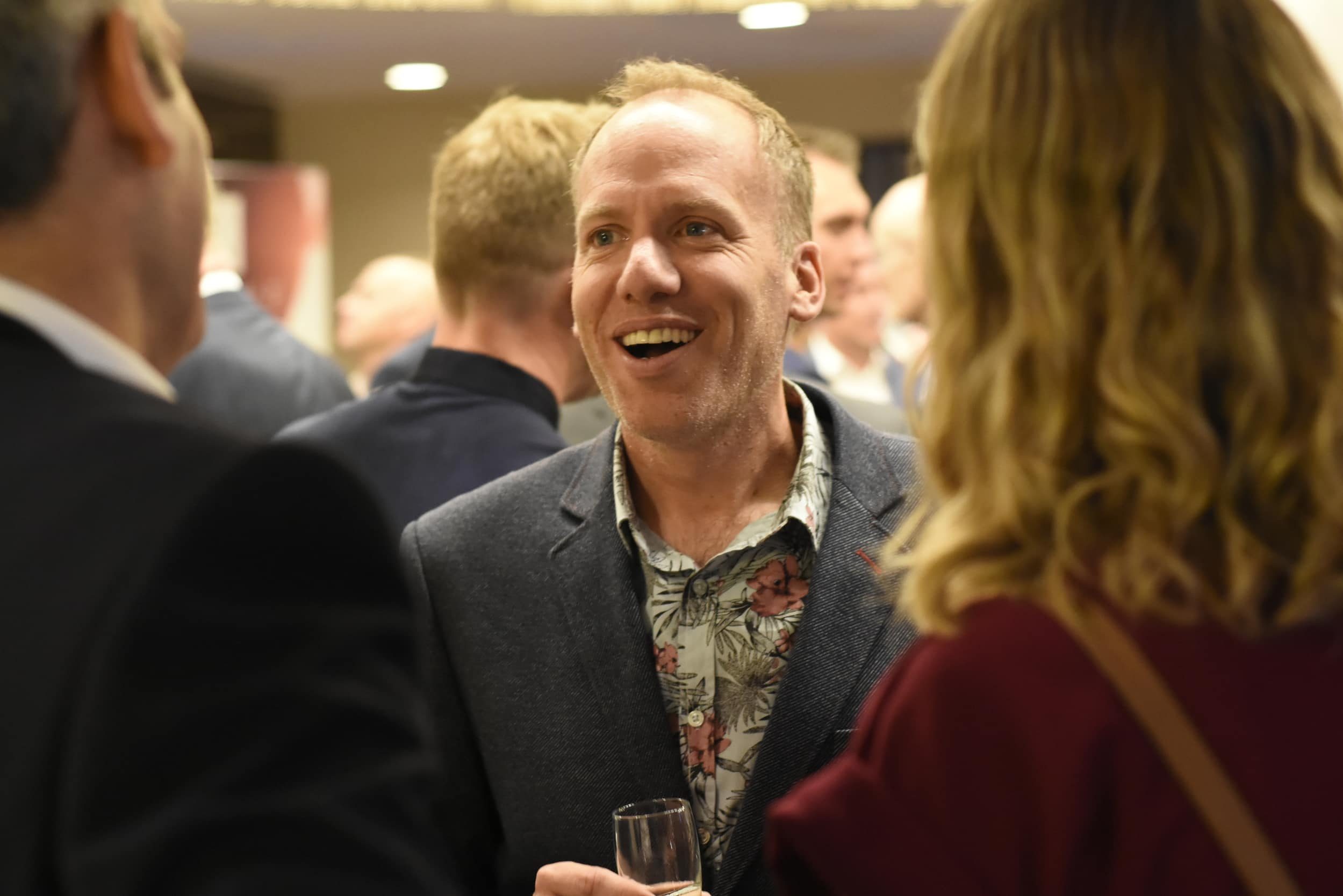 Mark Cribb smiling at networking event