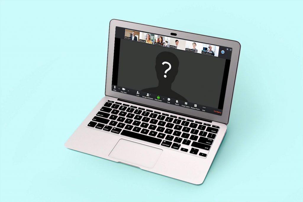 Laptop with screen showing a Zoom call in progress with main speaker a blank space with question mark.