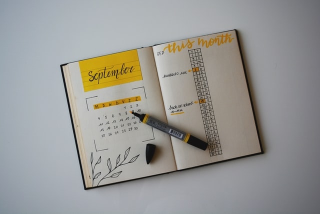 Diary open to September, with yellow highlighter. 