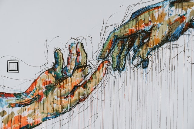 Painting of to hands almost touching their fingertips together.