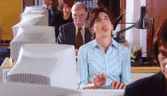 Gif of a woman typing frantically at her computer.